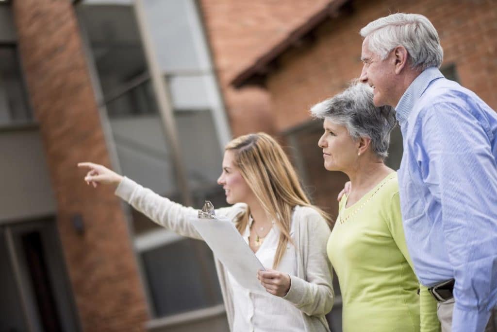 senior couple buying house